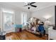Bedroom with hardwood floors and natural light, currently being used for storage during the moving process at 605 Smedes Pl # B, Raleigh, NC 27605