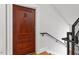 Elegant wooden front door with sidelight, enhancing curb appeal with a secure entrance at 605 Smedes Pl # B, Raleigh, NC 27605