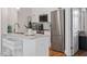 Bright, modern kitchen with marble countertops, stainless steel appliances, and convenient island seating at 605 Smedes Pl # B, Raleigh, NC 27605
