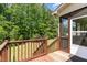 Cozy screened porch has beautiful views of the yard and lush greenery beyond at 70 Breadnut Dr, Smithfield, NC 27577