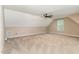 Large bonus room offering flexible space with neutral carpet, and a ceiling fan at 70 Breadnut Dr, Smithfield, NC 27577