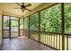 Enjoy this screened porch and the beautiful views of the lush backyard at 70 Breadnut Dr, Smithfield, NC 27577
