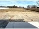 A large backyard with the foundation of a home at 86 Olivia Crossing Ct # 3, Four Oaks, NC 27524