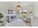 Stylishly decorated Bedroom with patterned wallpaper and a rocking chair at 86 Olivia Crossing Ct # 3, Four Oaks, NC 27524