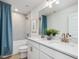 Modern bathroom with double vanity, tiled shower, and elegant fixtures at 95 Great Smoky Pl, Lillington, NC 27546
