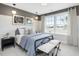 Comfortable bedroom featuring lots of natural light and neutral decor at 95 Great Smoky Pl, Lillington, NC 27546