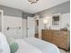 Serene bedroom features modern furniture, natural light, and relaxing atmosphere at 95 Great Smoky Pl, Lillington, NC 27546