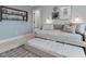 Comfortable bedroom showing trundle bed, stylish decor, and soft blue walls at 95 Great Smoky Pl, Lillington, NC 27546