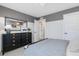 Bedroom with large dresser, stylish decor, and neutral colors at 95 Great Smoky Pl, Lillington, NC 27546