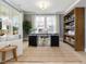 Comfortable home office space with natural light and built-in shelving at 95 Great Smoky Pl, Lillington, NC 27546