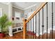 Mudroom-style entryway with custom bench, storage, and convenient access to the stairs at 1209 Kingston Ridge Rd, Cary, NC 27511