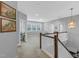 Spacious second-floor hallway filled with natural light from the many windows at 156 Greenhurst Cir, Holly Springs, NC 27540