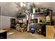 Attic featuring exposed beams, a ceiling fan and an array of stored items at 166 Creek Dr, Louisburg, NC 27549