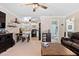 Open-concept space connecting living room with kitchen and bathroom views at 166 Creek Dr, Louisburg, NC 27549
