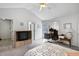 Bedroom featuring a walk-in closet and exterior door, and work area at 180 Normandy Rd, Louisburg, NC 27549