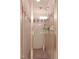 Modern shower with a glass enclosure, tiled walls, and a rainfall showerhead at 180 Normandy Rd, Louisburg, NC 27549