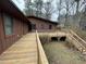 Spacious wooden deck and backyard, ideal for enjoying the outdoors and entertaining guests at 182 Tree Cutters, Sanford, NC 27332