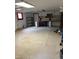 Unfinished basement with concrete floors, shelves, and ample space at 182 Tree Cutters, Sanford, NC 27332