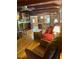 Inviting living room with wood floors, exposed beams, and comfortable seating arrangement at 182 Tree Cutters, Sanford, NC 27332