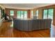 Expansive living area featuring wood floors, ample seating, and a bright, airy atmosphere at 182 Tree Cutters, Sanford, NC 27332