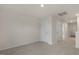 Bedroom with neutral carpet with two closet doors and two hall doors at 209 Leven Dr, Gibsonville, NC 27249