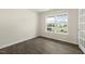Stylish living room boasts hardwood floors, natural light from windows, and glass doors at 209 Leven Dr, Gibsonville, NC 27249