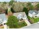 Charming two-story home with a well-maintained lawn and mature trees in a lovely neighborhood at 209 Plyersmill Rd, Cary, NC 27519