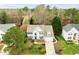 Stunning aerial view of a traditional two-story home with a well-manicured lawn at 209 Plyersmill Rd, Cary, NC 27519