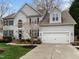 Charming two-story home features a two-car garage, well-maintained lawn and beautiful landscaping at 209 Plyersmill Rd, Cary, NC 27519