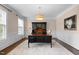 Office with large desk, decorative rug, and natural light at 209 Plyersmill Rd, Cary, NC 27519