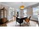 Office with large desk, decorative rug, and natural light at 209 Plyersmill Rd, Cary, NC 27519