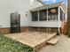 Outdoor patio features brick pavers, garden space, and access to the screened-in porch at 209 Plyersmill Rd, Cary, NC 27519