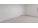Bright, carpeted bedroom with a window and neutral decor at 215 Leven Dr, Gibsonville, NC 27249