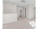 Upstairs bonus room featuring neutral carpet and access to a bathroom at 215 Leven Dr, Gibsonville, NC 27249