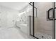 Bright bathroom boasts a soaking tub, tiled shower, and double sink vanity at 230 Sutherland Dr, Franklinton, NC 27525