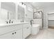 Modern bathroom features a double vanity, freestanding tub, and tiled shower at 230 Sutherland Dr, Franklinton, NC 27525