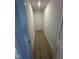 Narrow closet with modern trim and paint and wood look flooring at 240 Sutherland Dr, Franklinton, NC 27525