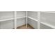 Walk-in pantry with custom shelving provides ample storage space, and plenty of room for organization at 240 Sutherland Dr, Franklinton, NC 27525
