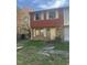 Inviting two-story townhome with brick and siding, complemented by a quaint front yard at 2408 Stadium Dr # A, Durham, NC 27704