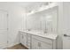 Bright bathroom boasts double vanity, modern fixtures, and a glass shower, blending comfort and style at 269 Marvel Dr # 138, Rolesville, NC 27571