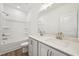 Well-lit bathroom with double vanity, bathtub and shower, and modern finishes for everyday convenience at 269 Marvel Dr # 138, Rolesville, NC 27571