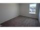 Bedroom with carpet and natural light from single window with a view of outdoor scenery at 269 Marvel Dr # 138, Rolesville, NC 27571