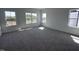 Comfortable bedroom with plush carpeting and multiple windows offering a view of the outdoors at 269 Marvel Dr # 138, Rolesville, NC 27571