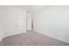Bright bedroom with neutral carpet and paint, plus a double-door closet and ensuite access at 269 Marvel Dr # 138, Rolesville, NC 27571