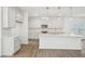 Spacious kitchen featuring a large island, modern cabinets, and ample counter space at 269 Marvel Dr # 138, Rolesville, NC 27571