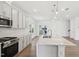 Kitchen island with a stainless steel sink, quartz countertops, and stainless steel appliances at 269 Marvel Dr # 138, Rolesville, NC 27571