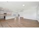 Open concept with gray cabinets, quartz counters, and an island that creates an inviting atmosphere at 269 Marvel Dr # 138, Rolesville, NC 27571