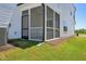 Exterior shot of a screened in porch with black screen and white painted wood at 269 Marvel Dr # 138, Rolesville, NC 27571