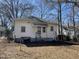 Backyard exterior featuring a canopy, steps, and access to the house at 2711 Ashe St, Durham, NC 27703