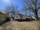 Backyard featuring some trees and ample space at 2711 Ashe St, Durham, NC 27703